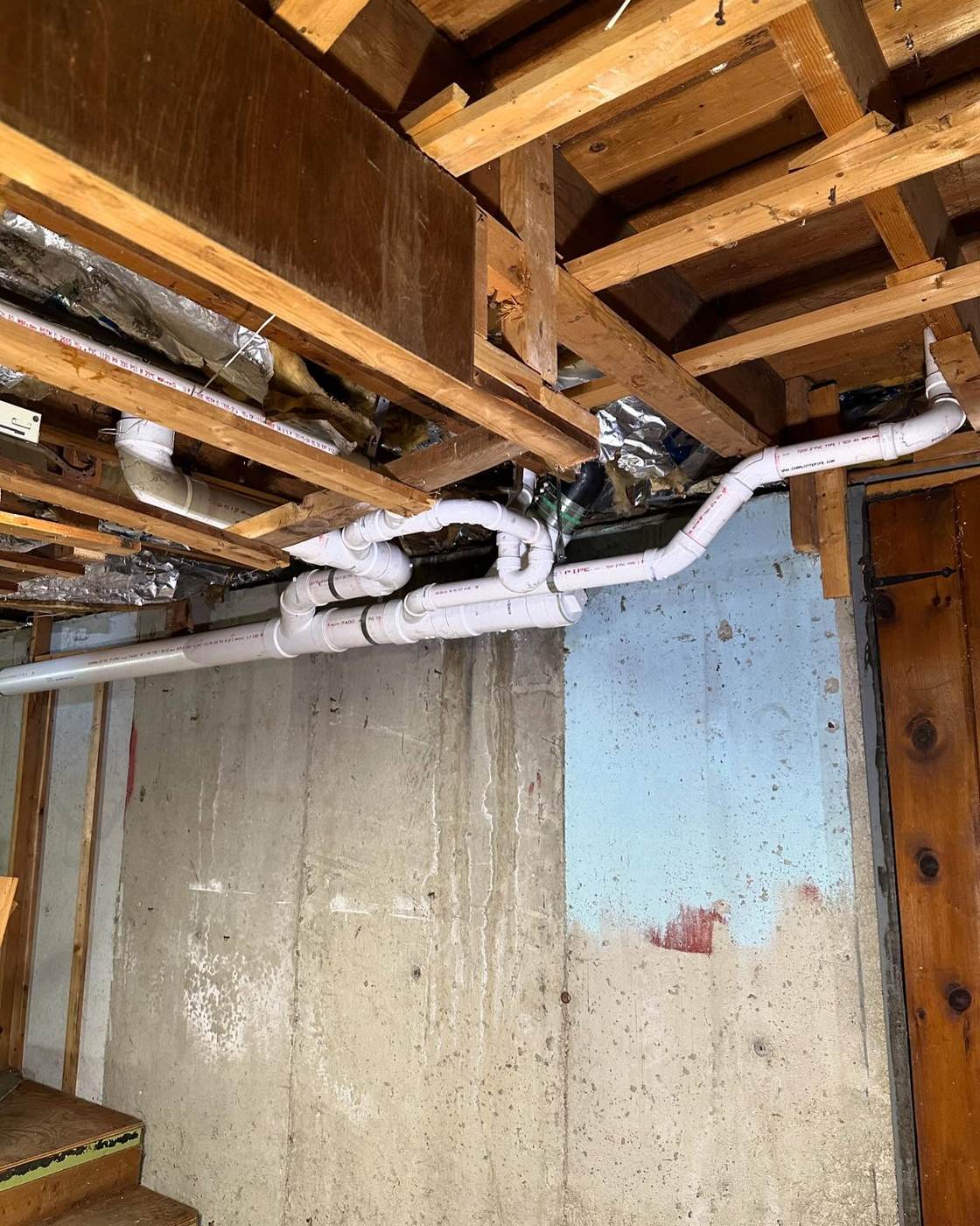 40+ feet of cracked, back-pitched cast iron swapped to PVC